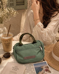 Green cross-body bag